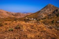 Rocky, volcanic inland landscape with spiked hill and dried vegetation on late summer,Limnos