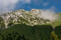 The rocky white massif of the Piatra Craiului mountain range in the Romanian Carpathians Royalty Free Stock Photo