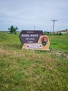 Badland national park entrance sign in South Dakota summer