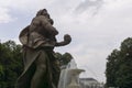 A Rococo style sculpture at Saxon Garden with a big fountain and cloudy sky Royalty Free Stock Photo