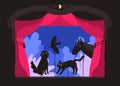 Rod shadow puppets manipulated by puppeteer at theater stage. Telling of scary story, entertaining performance with