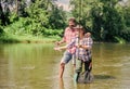 Rod tackle. Fishing equipment. Hobby sport. Fishing peaceful activity. Father and son fishing. Grandpa and mature man Royalty Free Stock Photo