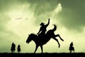 Rodeo cowboy silhouette at sunset Royalty Free Stock Photo