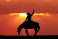 Rodeo cowboy at sunset Royalty Free Stock Photo