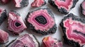 Rodonite displaying its stunning pink and black patterns, elegantly laid out on a white background Royalty Free Stock Photo