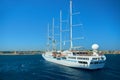 RODOS ISLAND, GREECE, JUN 25, 2013: View on beautiful classic white yacht WIND SPIRIT Nassau with tourists. Greek island holidays.
