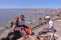 RODRIGUES ISLAND, MAURITIUS - NOVEMBER 13, 2012: Octopus fishing with three local boys posing