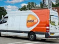 View on parcel delivery van car of dutch company postnl