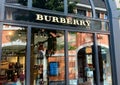 View on facade with logo lettering of Burberry fashion company at shop entrance