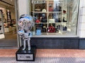 View on Karl Lagerfeld store entrance with silver figure of the designer with the cat choupette