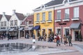 Roermond, Netherlands 07.05.2017 People walking around at the Mc Arthur Glen Designer Outlet shopping center area