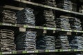 Roermond, Netherlands 07.05.2017 Stack of blue superslim Jeans at the Garcia Store Mc Arthur Glen Designer Outlet