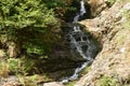 Roes, Germany - 08 16 2022: Elz waterfall between rocks