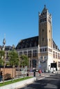 Roeselare, East Flemish Region - Belgium - Rectangular churchtower at the main market square in summer