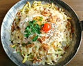 The `Roesti` is a traditional swiss dish made with grated potatoes