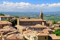 Roftops of houses and Sant`Agostino Church in Montalcino, Val d`