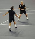 Roger Federer and Bjorn Borg in actions