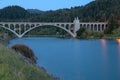 The Rogue River bridge with the obelisk illuminated at sunset in Gold Beach, Oregon, USA Royalty Free Stock Photo