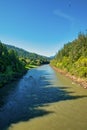 Rogue River in Southern Oregon during a summer day. Vertical image. Royalty Free Stock Photo