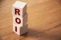 ROI letters meaning Return on Investment on wooden cubes. Business concept Royalty Free Stock Photo