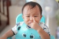 Asian Boy making Funny face after eat by himself with Baby Led Weaning BLWmethod, Self Royalty Free Stock Photo