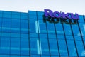 Roku sign and logo on the modern facade of consumer electronics and broadcast media company headquarters in Silicon Valley