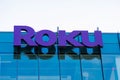 Roku sign and logo on the modern facade of consumer electronics and broadcast media company headquarters in Silicon Valley