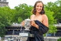 2023 Roland Garros Champion Iga Swiatek of Poland posing with The Suzanne-Lenglen Cup at the Pont de Bir-Hakeim