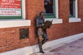 Roland Manteiga statue on Centro Espanol building background in 7th Ave. Royalty Free Stock Photo