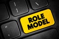 Role Model - person whose behaviour, example, or success is or can be emulated by others, text button on keyboard, concept
