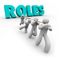 Roles Word Pulled by Team Members Jobs Duties Tasks Royalty Free Stock Photo