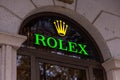 Rolex logo sign, green Rolex letters with gold yellow crown.