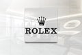 Rolex on glossy office wall realistic texture