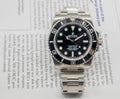 Rolex submariner on English paper