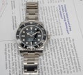 Rolex submariner on English paper