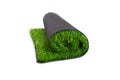 Roll of artificial green grass, carpet, artificial turf isolated on white background Royalty Free Stock Photo