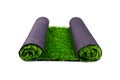 Roll of artificial green grass isolated on white background, lawn, covering for sports grounds