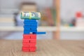 A roll of Australian dollar banknotes on tall blocks