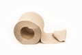 Roll of beige toilet paper on a white background