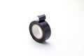 Roll of black insulating tape isolated on a white