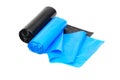 Roll of blue and black garbage bags on a white background Royalty Free Stock Photo