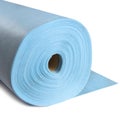 A roll of blue fabric on a white background. Royalty Free Stock Photo