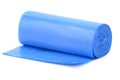A roll of blue plastic trash bags, lightly rolled out on a horizontal surface Royalty Free Stock Photo