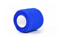 Roll of blue self adhesive medical elastic bandage on white background Royalty Free Stock Photo