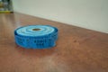 Roll of blue tickets labeled admit one for entry to carnival event Royalty Free Stock Photo