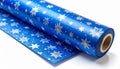 Roll of Blue Wrapping Paper with Silver Star Pattern on White Royalty Free Stock Photo