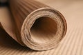 Roll of brown corrugated cardboard, closeup view Royalty Free Stock Photo