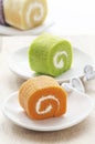Roll cake on white plate Royalty Free Stock Photo