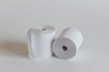 Roll of cash register tape on soft gray background