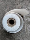 Roll of cash register tape spending money or business concept